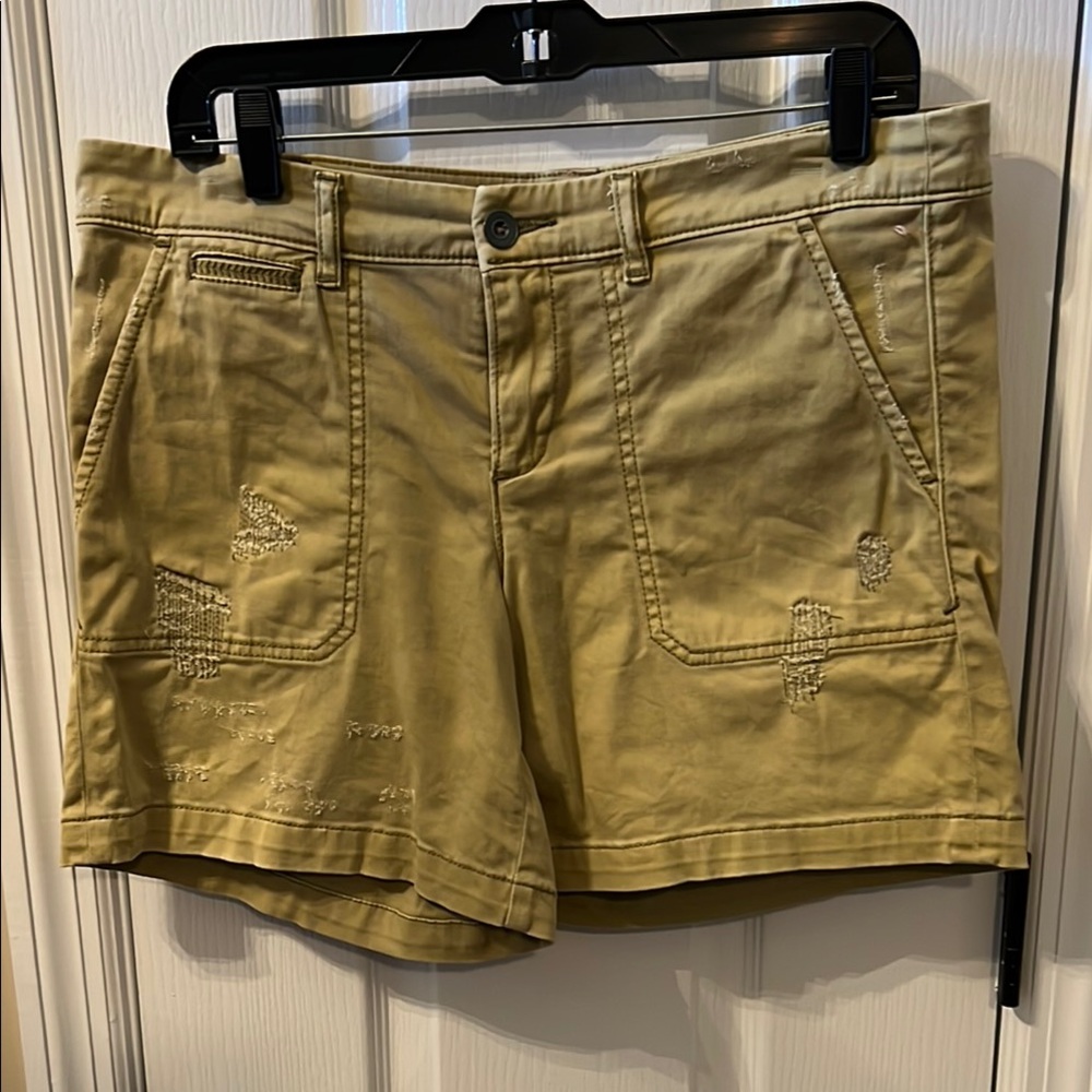 Pilcro hyphen distressed shorts from Anthropologie. 29. Light olive green.